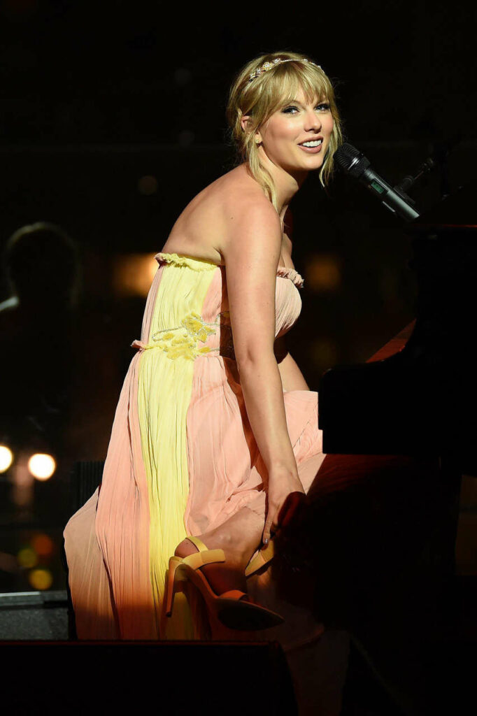 Taylor Swift Taking Of Her Heels Feet