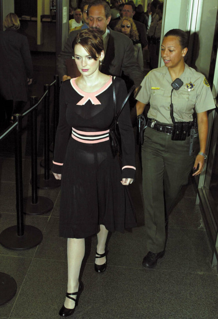 Winona Ryder In Beverly Hills Being Escorted Into Court For Felony Grand Theft Feet