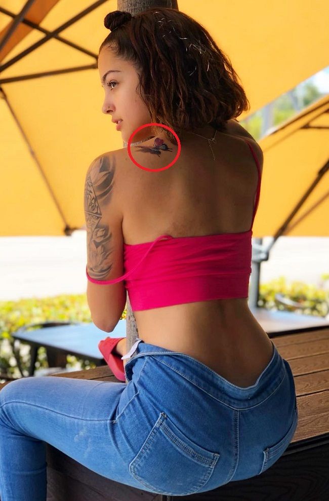 Tattoo: Tattoo of a 'butterfly' on his left shoulder.