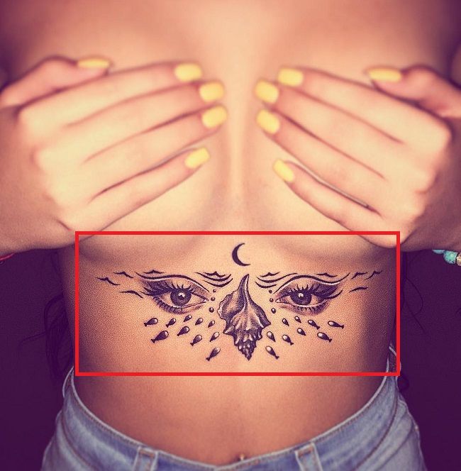 Tattoo: 'Eyes' tattoo under his chest.
