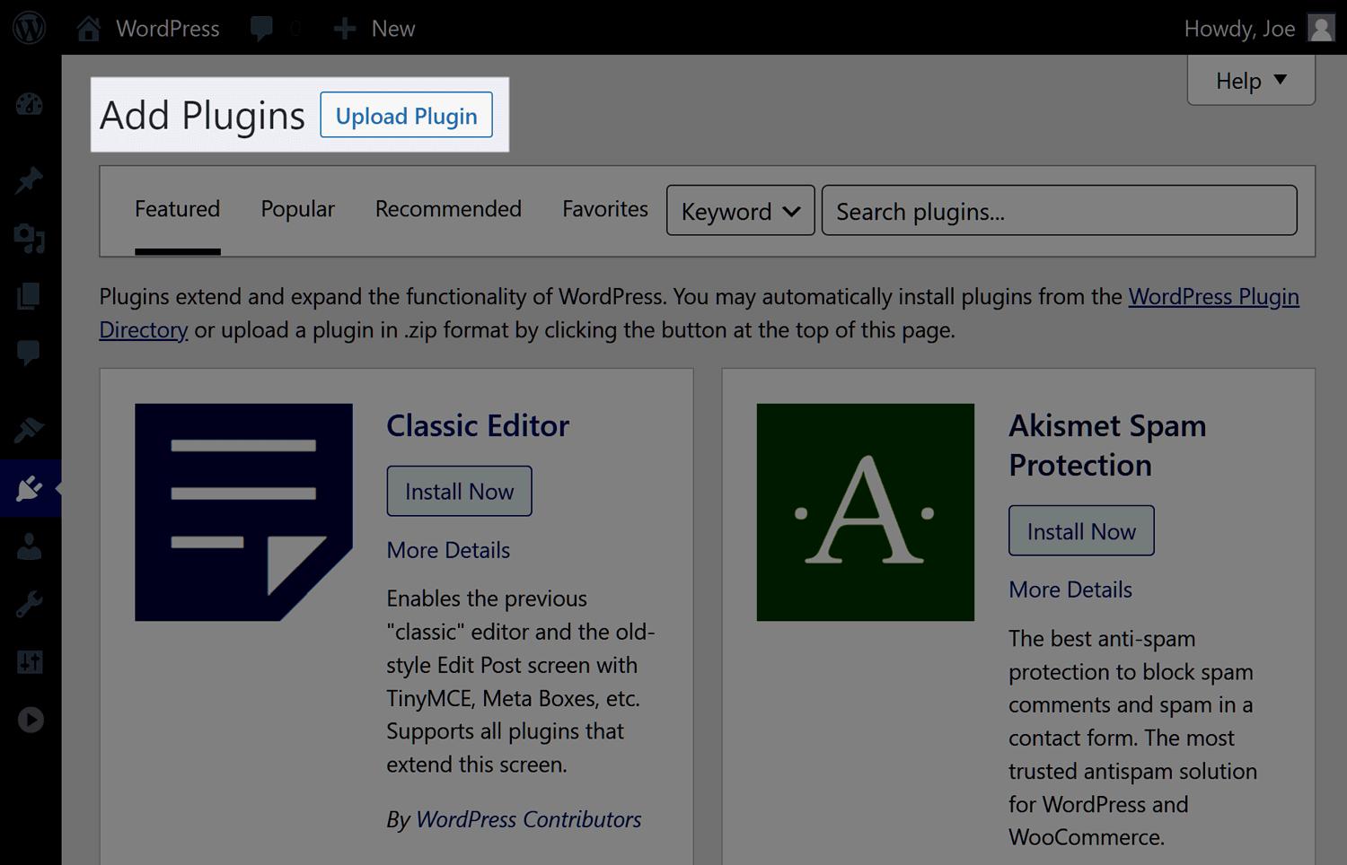 Tablero de WordPress con el botón Cargar complemento