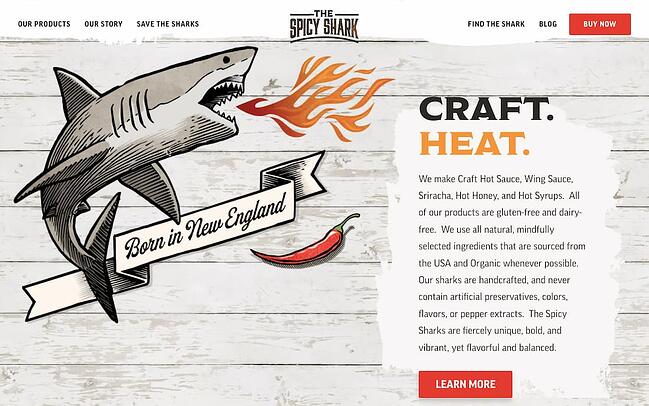 The cms hub: el ejemplo del sitio web Spicy Shark tiene un gráfico de tiburones y llamas