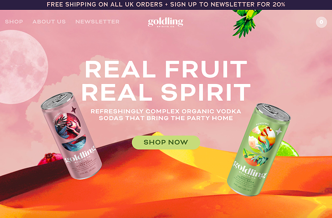 sitio web con imagen de fondo: Goldling Drinks tiene una imagen gráfica de un desierto dorado en el fondo