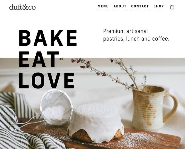 sitio web en blanco y negro: página de inicio de duft & co con un diseño minimalista que llama la atención sobre la imagen de pasteles y café