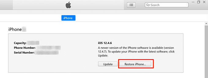 Botón restaurar iPhone en iTunes