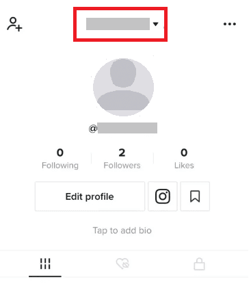 Vaya a su perfil de TikTok y toque la flecha desplegable en la parte superior.