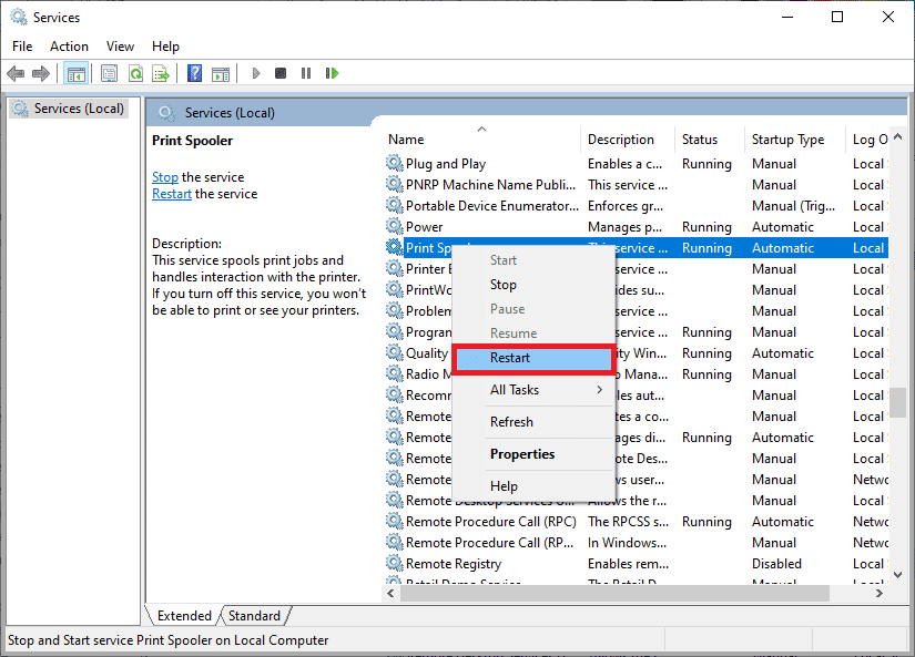 Ahora, en la ventana Servicios, desplácese hacia abajo y busque Print Spooler, y haga clic derecho sobre él.  seleccione la opción Reiniciar