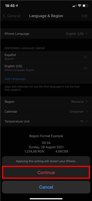 Toque Continuar en la ventana emergente para cambiar el idioma del iPhone o iPad