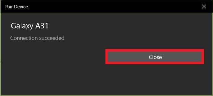Una vez que su PC se empareje con el teléfono inteligente, verá una ventana que muestra el mensaje Conexión exitosa. Haga clic en Cerrar.