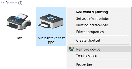 Haga clic derecho en Microsoft Print to PDF, luego seleccione Quitar dispositivo