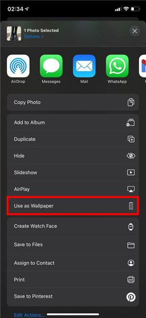 Seleccione Usar como fondo de pantalla para cambiar el fondo en iPhone