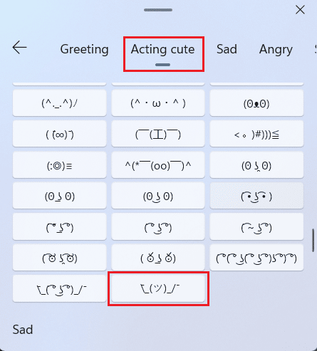 Desplácese hacia abajo para llegar a la pestaña Actuando lindo y haga clic en el emoticón de encogimiento de hombros