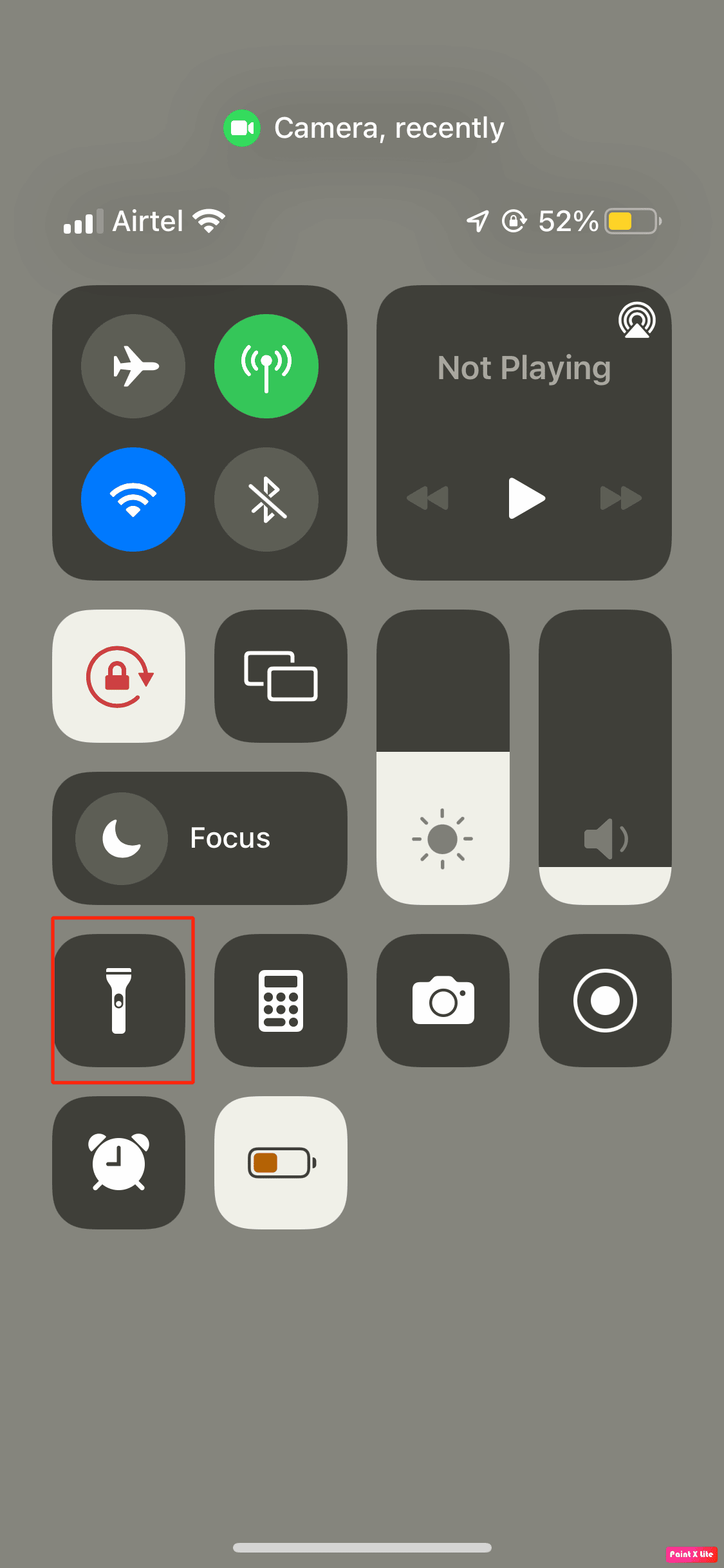 toque el icono de la linterna