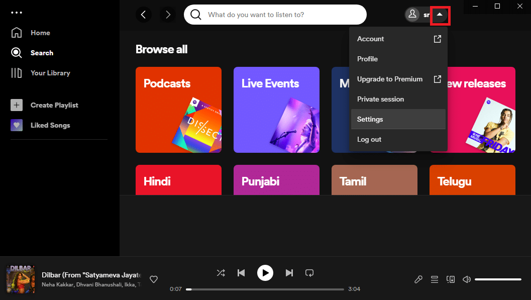 Haga clic en el icono de la flecha hacia abajo. Reparar la canción de vista previa de Spotify que no funciona